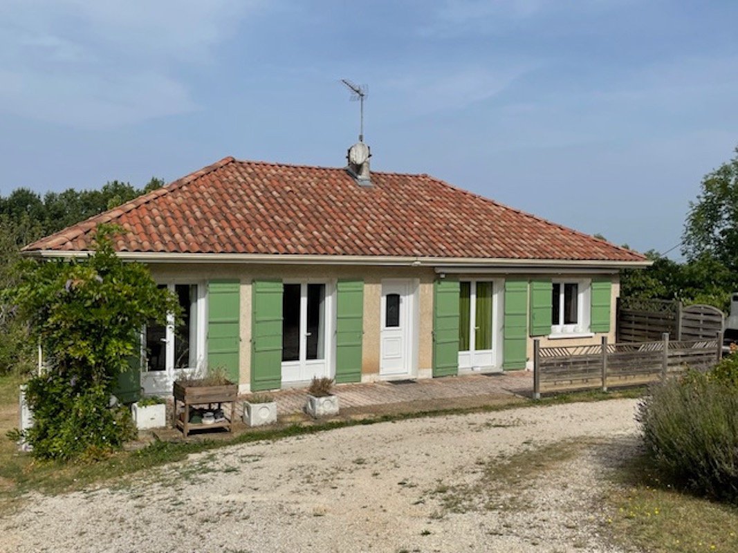 Plain-pied sur sous-sol  avec garage et terrain